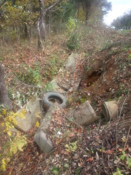 Drainage Ditch Damaged and Full of Trash