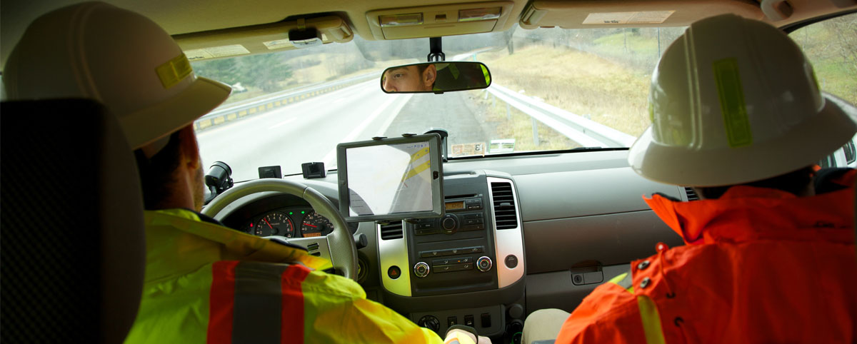 Guys in A truck Monitoring Highway