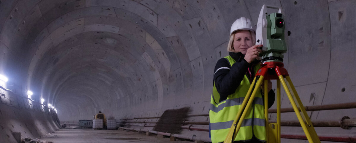 Surveyor in Underground Tunnel